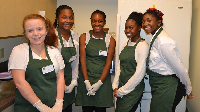 Volunteers helped serve the tea and treats at Milton's Downton Abbey tea