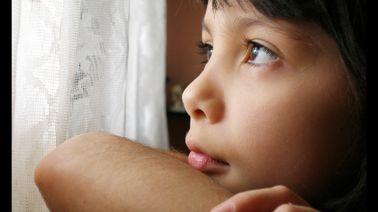 children looking out window