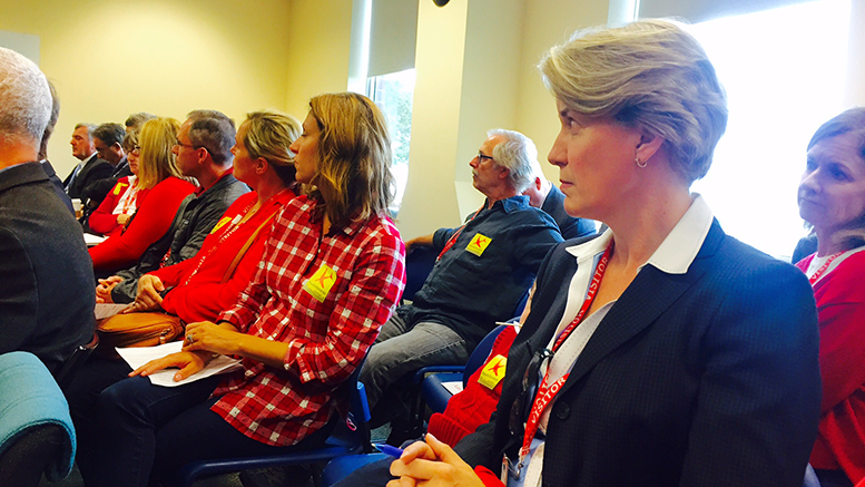Milton residents attend the Sept 15. MassPort board meeting to voice concerns of plane abuse. Many wear red in solidarity.