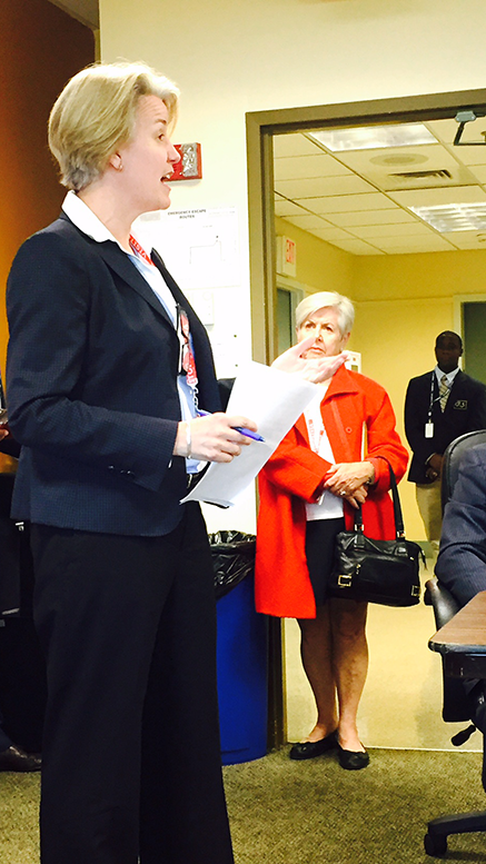 Milton resident Nora Harrington speaks about mental health issues associated with air traffic abuse at the Sept 15. Massport board meeting
