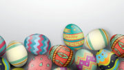 Colorful easter eggs on a gray background.