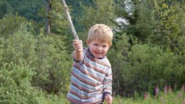 Boy with hiking stick