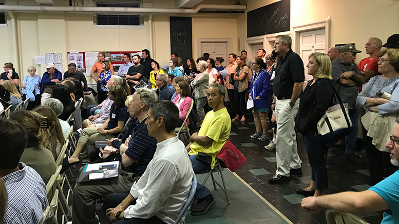 East Milton residents filled the seats and lined the walls as they voiced concerns about the proposed "friendly 40B" development by Falconi Properties