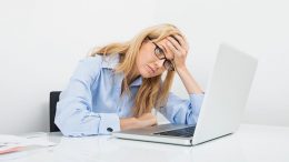 woman at computer / desk - frustrated