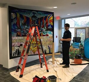 Holocaust window installation at Beth Shalom