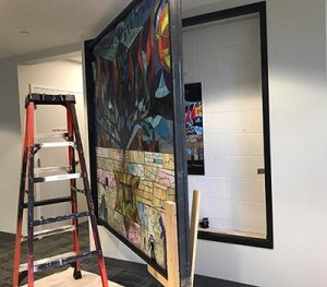 Holocaust window installation at Beth Shalom