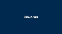 A blue background with the word kiwanis on it.
