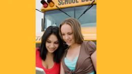 Teens in front of bus