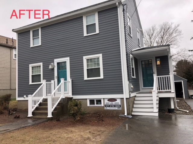 Capital Construction offers expert James Hardie siding installations for various projects, including a house with gray siding and a blue door.