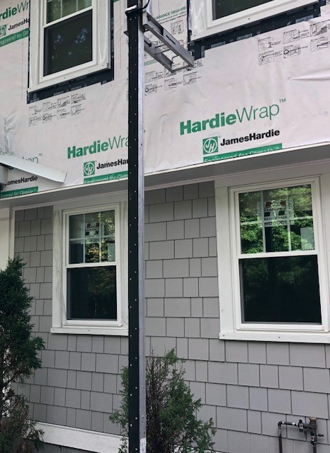 Capital Construction offers expert James Hardie siding installations for various projects, including the construction of a house with hardie wrap siding.