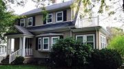 HOME FOR SALE: 39 Hurlcroft Road,Milton MA - A house with a porch and a deck.