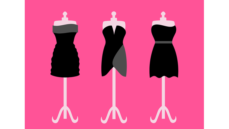 Three black dresses displayed on mannequins.