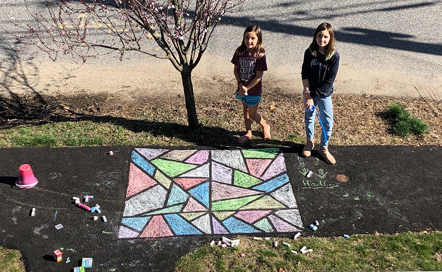 Chloe and Hadley Bergeron and some sidewall art they made.