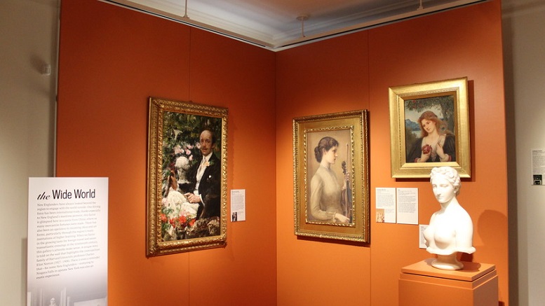 An art gallery showcasing paintings and a bust as part of its exhibit.