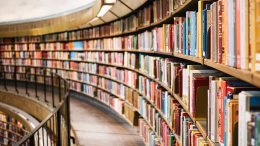 curved wall of library books