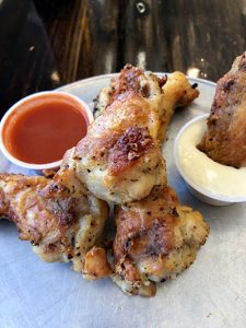 Peel Pizza Co. serves mouthwatering chicken wings on a plate as part of The Milton Scene Great Gift Card Giveaway for March.