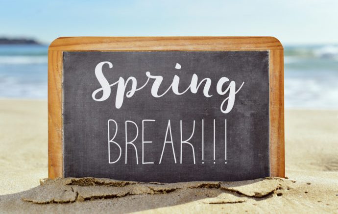 Spring break on chalkboard at the beach