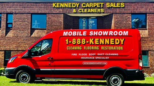 Kennedy Carpet logo and van