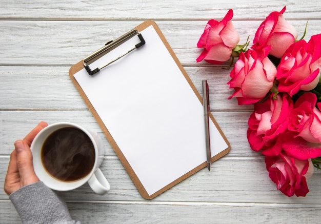 flowers, notepad, coffee