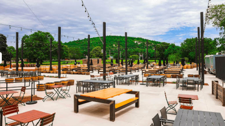 Friends of the Blue Hills Membership Appreciation Event on July 28 at a large outdoor area with tables and chairs.