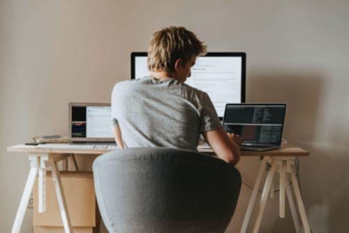 man working from home at computer