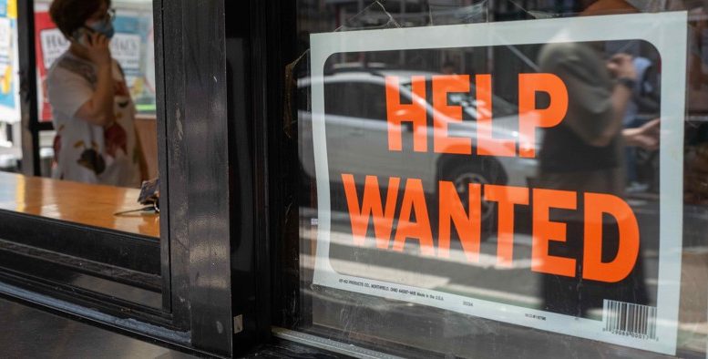 Help wanted in store window