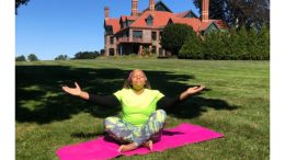Woman on a yoga mat meditating. Photo from Amy Morgan Link, Eustis Estate
