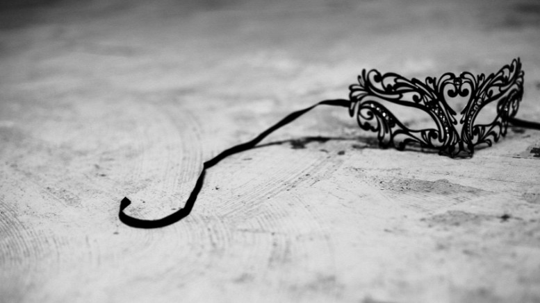 A black and white photo of a masquerade mask capturing the spirit of a glamorous Masquerade Gala Fundraiser.