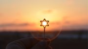 star of david at sunset. image; canva pro