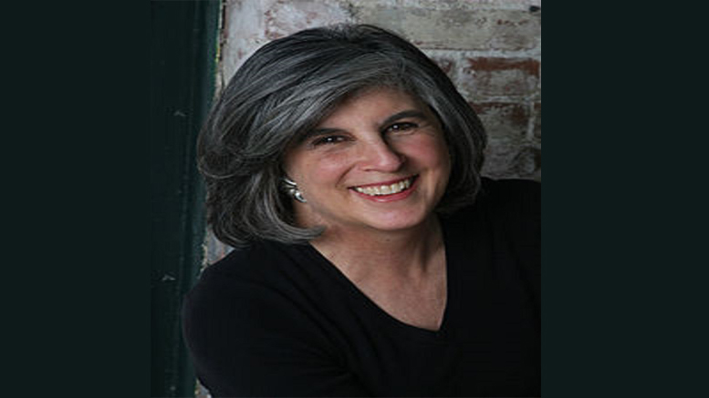 A woman with gray hair is smiling in front of a brick wall. The Milton Public Library announces adult programming for January 2024.