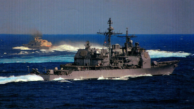 A navy destroyer sails on the ocean with another ship visible in a blast of smoke and spray, while the "Discover the World of Lilacs" program is broadcast in the background.