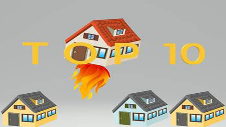 An illustration depicts houses with one flying upwards on flames, encapsulated by the text "TOP 10," signifying how Norfolk county real estate activity soars in April 2024. Three homes remain grounded below, highlighting the dramatic rise.