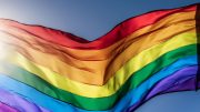 A rainbow flag waves against a clear blue sky as Milton proclaims LGBTQ pride month, celebrating diversity and inclusion on May 28, 2024.