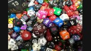 A large assortment of colorful polyhedral dice, including d20s, d12s, d10s, d8s, d6s, and d4s—perfect for adult fans of Dungeons & Dragons or gaming events at Milton Library.